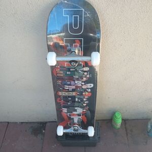 Graphic Skateboard with White Wheels